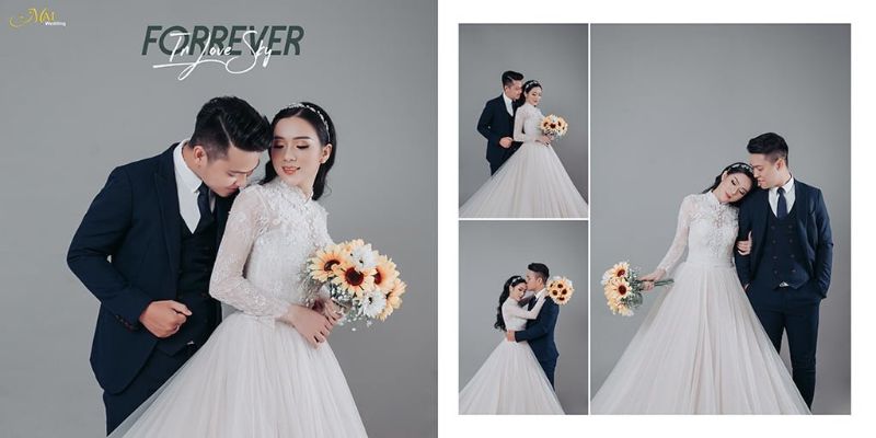 cô dâu và chú rể nắm bó hoa cưới làm bằng hoa hướng dương