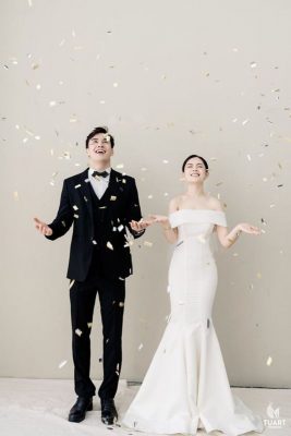 cô dâu chú rể tung lông vũ lên trời